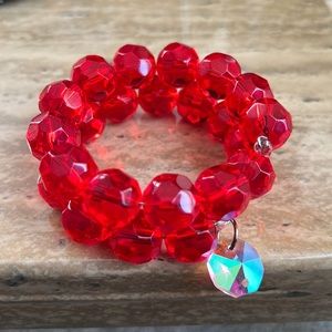 Red wrap bracelet with a clear charm